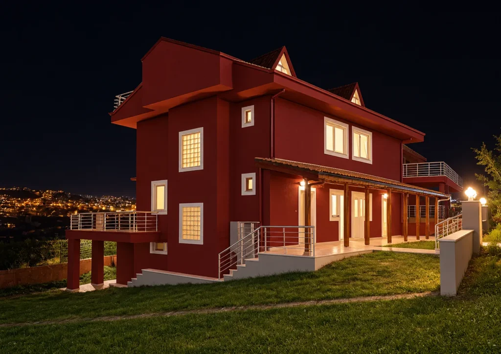 Şile Şelale Konakları ikiz villanın gece aydınlatmalı bordo yan cephesi ve terası